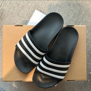 Women’s black adidas adilette slides size 4